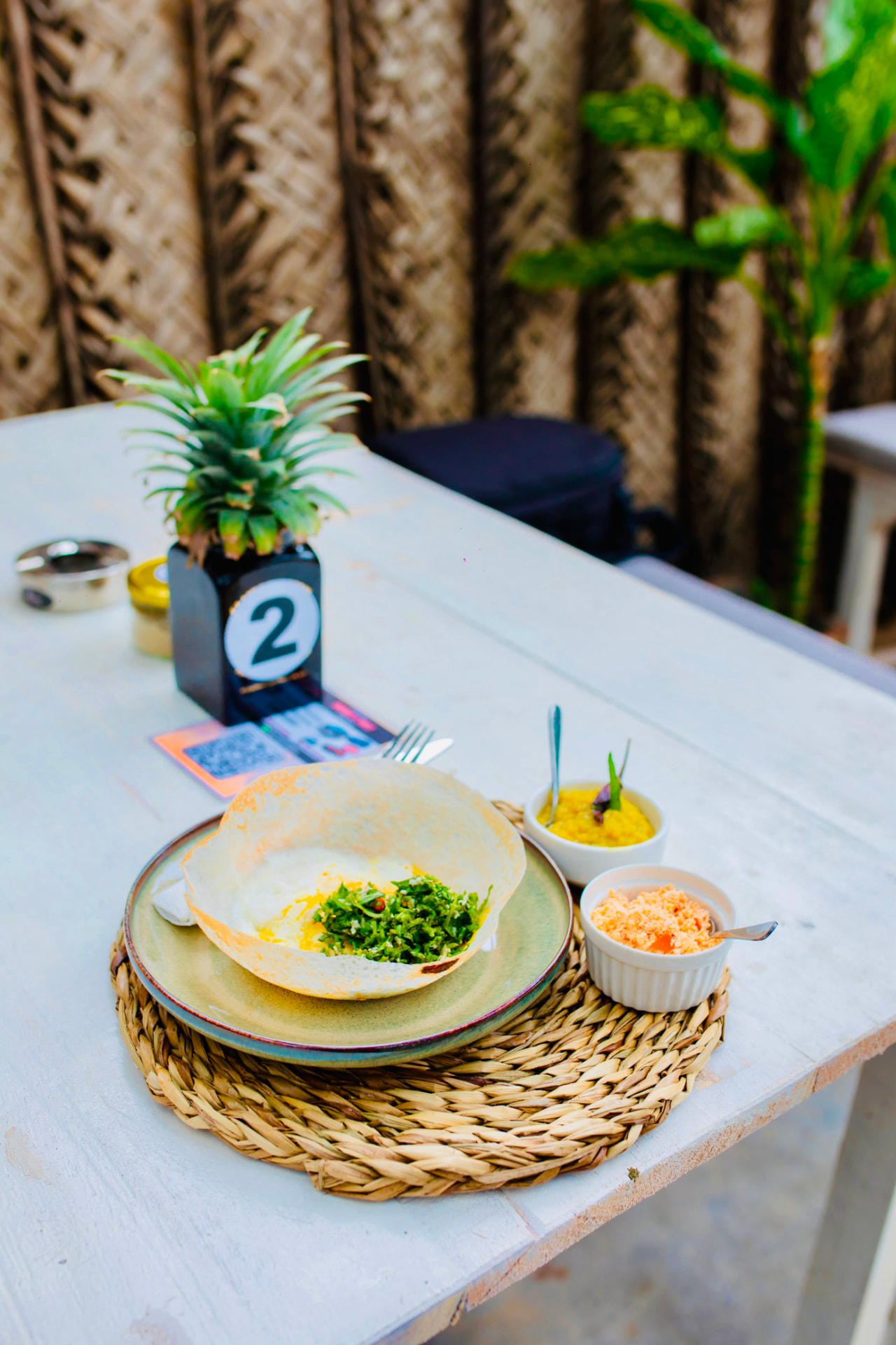 Classic hopper with gotu kola sambal and dal